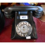 A vintage black Bakelite telephone