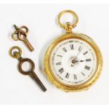 A continental marked 18k cased lever fob watch with ornate engraved decoration and decorative dial