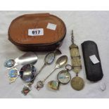 A small leather box containing a quantity of collectable items including fob compass, gold rim