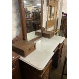 A 1.26m late Victorian break front marble topped kneehole dressing table with large oblong mirror