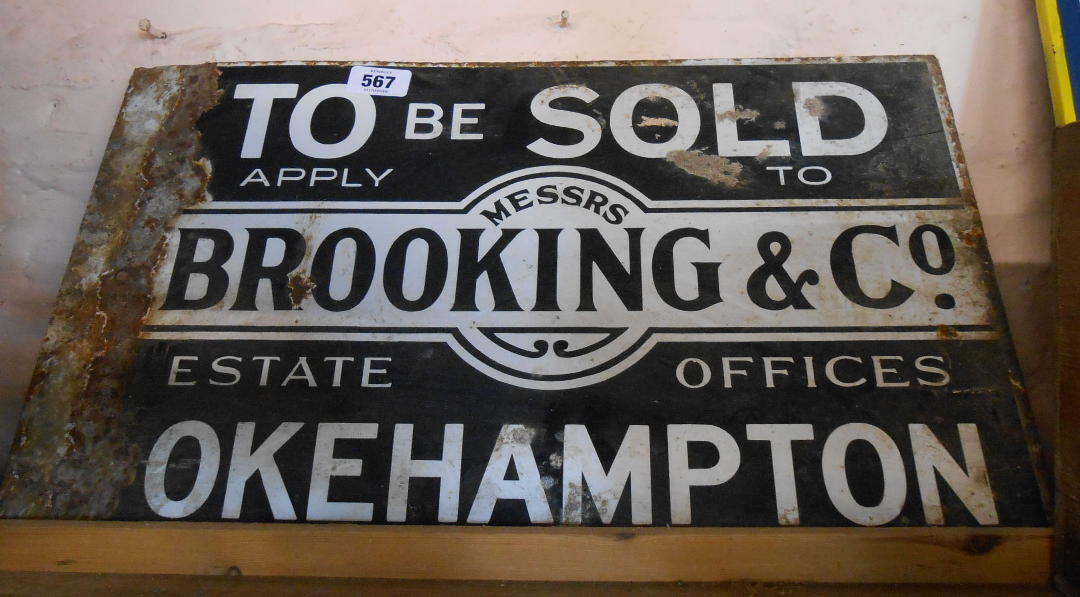 An old estate agents' enamel For Sale sign Messrs Brooking & Co, Okehampton
