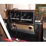 A vintage Bakelite cased Murphy portable flip top valve radio