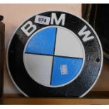 A modern cast metal painted BMW sign