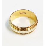 A 375 gold wedding band