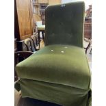 A late Victorian boudoir chair with later green velour upholstery, set on turned front legs