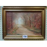 Piper: a small modern gilt framed oil on board, depicting an Autumnal woodland path - signed