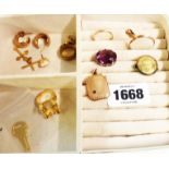 A jewellery box containing small lockets, ring shank, small crosses and ear-rings