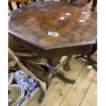 A Victorian rosewood trumpet work table with sewing contents, set on faceted tapered pillar and