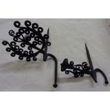 Two Andalusian wrought iron wall hooks with scrolling band decoration