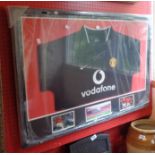 A framed and perspex glazed Manchester United football shirt with signature for Ryan Giggs and