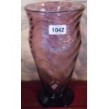 A Webbs amethyst glass flower vase in the Venetian ripple pattern