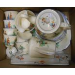 An Art Deco Midwinter pottery part tea set decorated with a colourful transfer print of a windmill