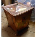 An Art Deco copper plated brass coal bucket and lid with decorative fan motifs and drop handles