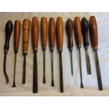 Eleven vintage carving chisels