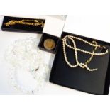 A quantity of boxed and loose costume jewellery including a rhinestone necklace
