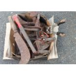 A box of tools including a castrater, cobblers' lasts, etc.