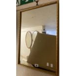 A modern gilt framed wall mirror with oblong plate