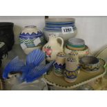 A small selection of Poole Pottery items including vases, cruet, bluebird wall plaque, etc. -