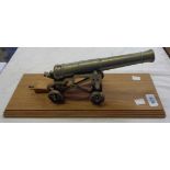 An all brass model cannon