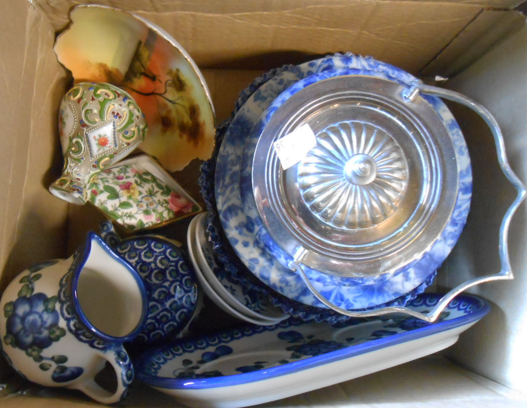 A box containing a quantity of ceramic items including Noritake, blue and white, etc.