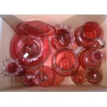 A box containing a quantity of cranberry glass items including jugs, bowls, vases, etc. - various