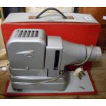 A vintage Gnome slide projector in case