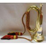 A modern brass bugle