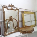 A vintage Aesonia ornate gilt wood wall mounted console mirror, with urn pediments bevelled and