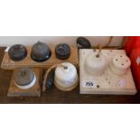 A quantity of old electrical fitting items including brass fronted and Bakelite light switches,