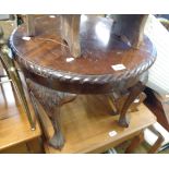 An antique style mahogany pie crust tea table, set on cabriole legs with claw and ball feet - for