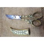 A pair of 19th Century brass pruning shears with decorative brass sheath - registration number for