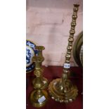 A pair of Victorian brass candlesticks - sold with a cast brass lamp base