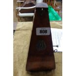 An old wooden cased metronome