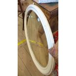 A 1.03m vintage painted wood framed oval wall mirror