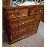 A 1.17m 19th Century mahogany chest of two short and three long graduated drawers, set on rounded