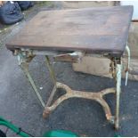An old cast iron metamorphic table mangle