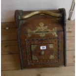 A late Victorian Benham and Froud brass mounted oak slope fonted coal box of Dr. Christopher Dresser