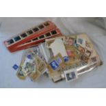 A small collection of posted letters, stamps on paper and a set of 1961 Chad Valley projector slides
