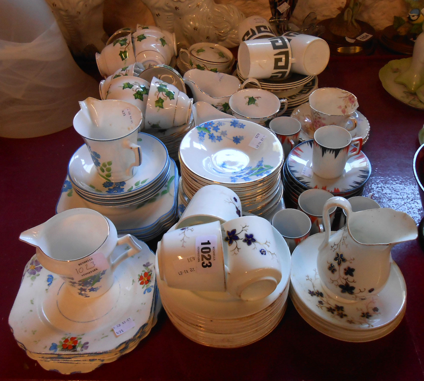 A large quantity of assorted teawares including Susie Cooper part coffee set, Colclough ivy