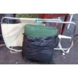 A large chrome plated tubular framed canvas slung chair with separate cushion