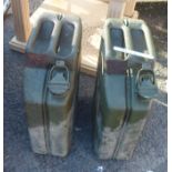 Two green painted jerry cans