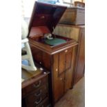 A vintage mahogany cabinet cased HMV wind-up gramophone with lift-top, sound doors and Crescendo