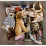 A small plastic crate containing assorted continental porcelain and other figurines - various