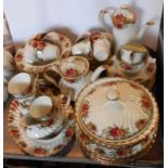 A quantity of Aynsley dinner ware decorated in the Country Roses pattern