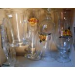 A box containing three Hard Rock Cafe drinking glasses, a Dartington tankard and moulded glass