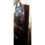 A 1.07m late 19th Century mahogany Chippendale style book cabinet by T. Simpson & Sons of Halifax