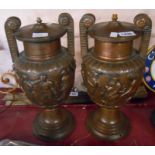 A pair of cast brass table lamps with copper finish of krater form decorated with a Dionysian frieze