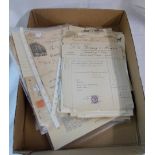 A box containing a small collection of paper ephemera including numerous old receipts, etc.