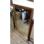 A modern gilt framed oblong wall mirror - minor loss to moulding - sold with a gilt framed mirror