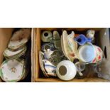 Two boxes containing a quantity of assorted ceramic items including Staffordshire cow creamers, etc.